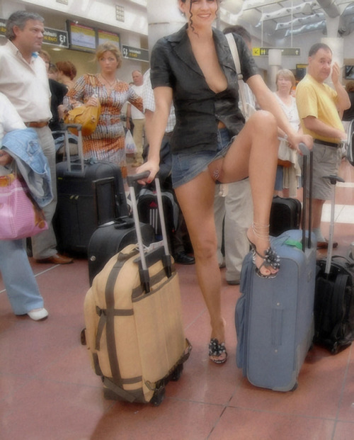 carelessinpublic:In a short skirt and showing her pussy in a busy airportTerrific x.