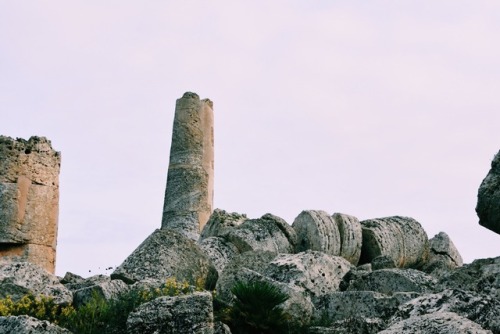 climbing on the giant remains of the collapsed Temple G at Selinunte ft. my classmates