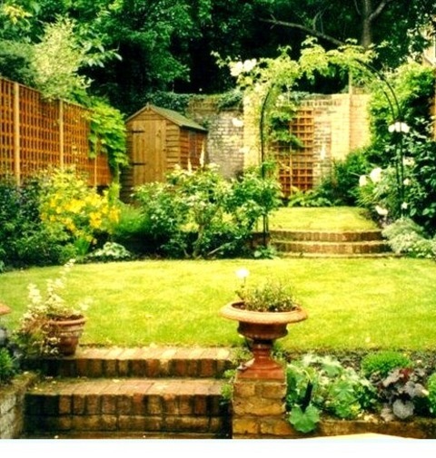 Traditional Landscape - LandscapeSummertime Photo Of A Medium-sized, Traditional, Full-sun Backyard With