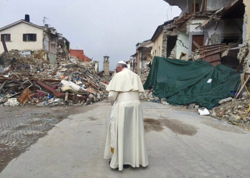 Pope Francis prays in Amatrice, following the August 2016′s earthquake that destroyed the city.> 