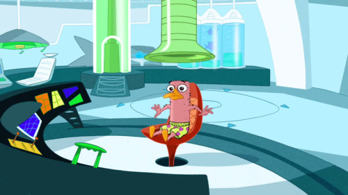 My favorite Lair Entrance from Phineas and Ferb. In the episode “Perry Lays An Egg,” Perry enters his lair through the new Pneumatic Transporter. Unfortunately for him, it has a nasty habit of sucking all the fur off of whoever uses it. 