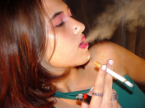 sexygirlssmoking: Click here to see more sexy girls smoking