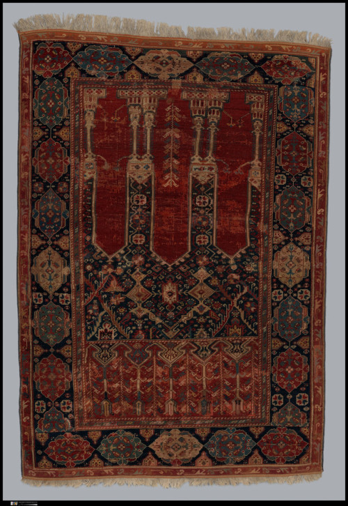 Prayer Rug with Coupled Columns by Islamic ArtMedium: Wool (warp, weft and pile symmetrically knotte