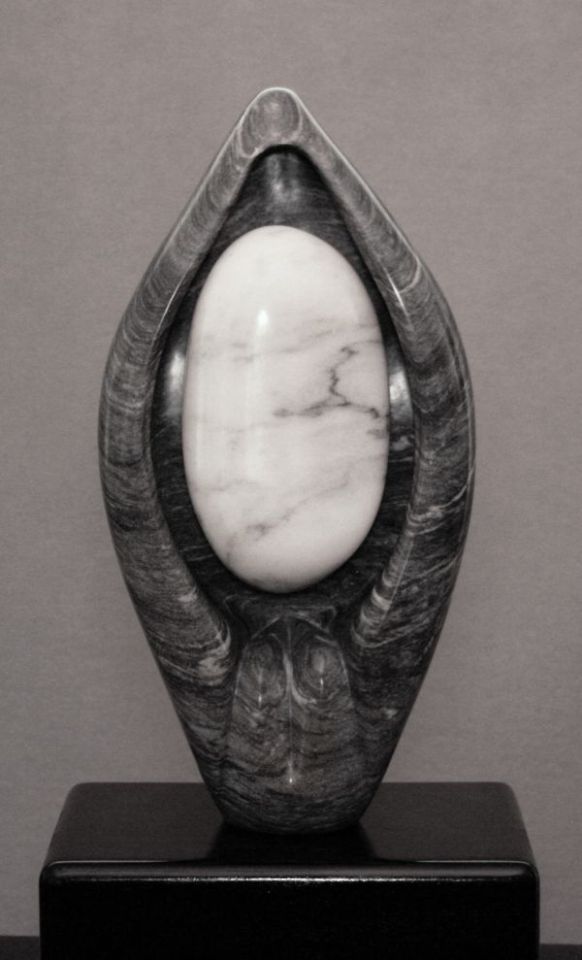 A sculpture titled White Seed (Big Abstract Pod Inspired sculpture) by sculptor Denis Yanashot. In a medium of West Rutland Gray Marble, Danby Marble. #artist#sculpture#sculptor#art#fineart#Denis Yanashot#Marble#stone#limited edition