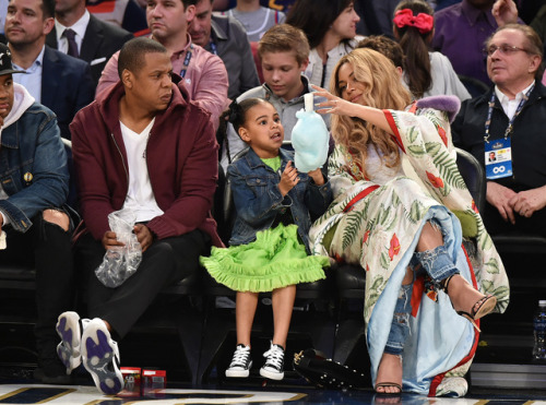 Jay Z, Blue Ivy Carter and Beyoncé at the 66th NBA All-Star Game in New Orleans, Louisiana.