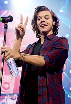 XXX mr-styles:  One Direction performs onstage photo