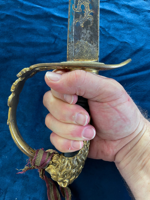 In the vein of @victoriansword post showing different grips for holding swords above are some photos