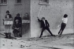 historicaltimes:  Youths attacking British Troops, Belfast. 1971. via reddit 