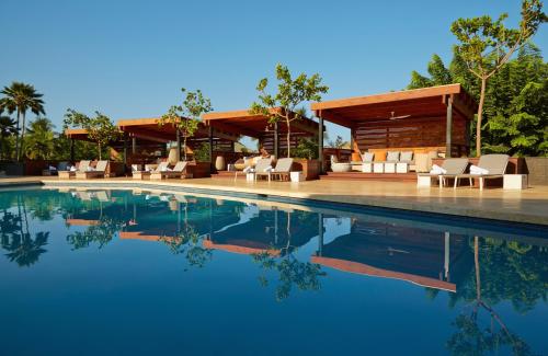 forbes-life:  8 Outrageously Gorgeous Hotel PoolsFloating in any body of water is pretty dreamy, but today’s hospitality  designers have found more and more ways to elevate the humble hotel  swimming pool into a spectacular work of art. The most beautiful