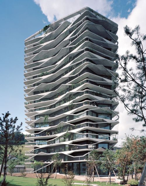 enochliew:  Green Residential Garden Tower by Buchner BründlerThe tower not only opens up on all sides to afford views but also brings the natural landscape and its qualities of living directly into the architecture by means of the vertical plantings.