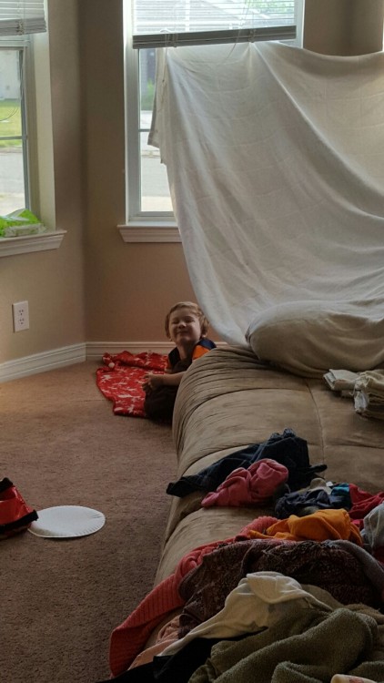 We decided a Fort was necessary while momma doors laundry.. I wonder what they are doing in there