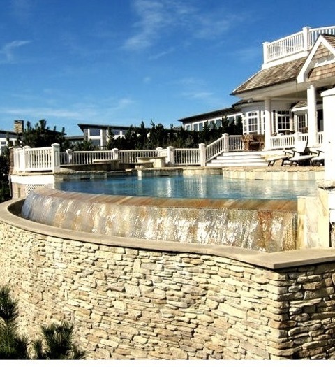 Pool - Beach Style PoolIdea For A Mid-sized, Custom-shaped Infinity Hot Tub In A Coastal Backyard Made