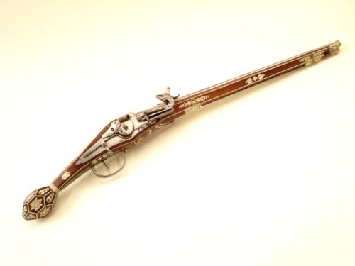 A double barrel Saxon made wheel-lock pistol, circa 1610.Estimate Value: $40,000 - $60,000