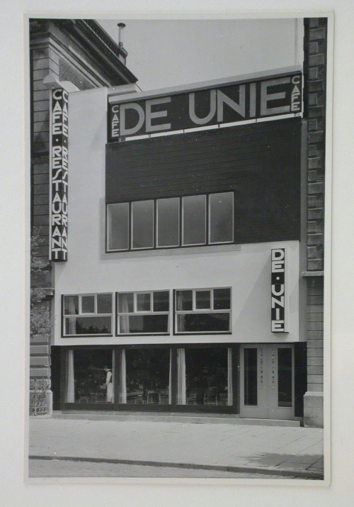 rosswolfe:
“ View of Cafe de Unie in Rotterdam, designed by the architect J.J.P Oud. Several groups stand at sides of image looking towards the photographer, 1933. (via http://thecharnelhouse.org/2014/05/27/jjp-oud-cafe-de-unie-in-rotterdam-1925/)
”