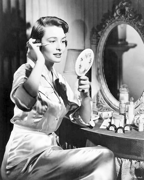 the-marriage-of-heaven-and-hell:    Old Hollywood Stars doing their make up [part.2],