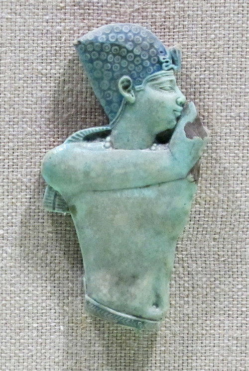 Ancient Egyptian faience applique, depicting a man wearing the blue crown known as the khepresh.&nbs