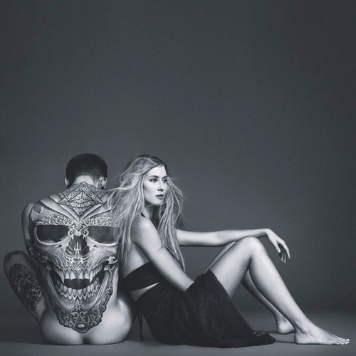 vmagazine:  Tattooed model and footballer Stephen James with Sports Illustrated model Vanessa Lorenz