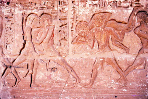 Relief depicting wrestlers Detail of a wall carving from the Mortuary Temple of Ramesses III. N