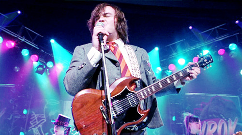 thatwetshirt:  School of Rock (2003)  God of Rock, thank you for this chance to kick ass. We are your humble servants. Please give us the power to blow people’s minds with our high voltage rock. In your name we pray, Amen.  