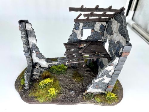 Some cute little ruins from Warlord Games, dolled up with some old school Warhammer Empire bits.