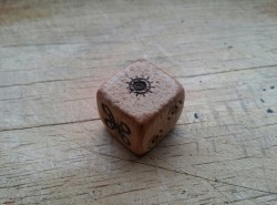 ringwinner-and-luckwearer:  I made a die, burned the art into the wood. This was my first try and I’m happy with the result, so I’ll make some more stuff I guess. 