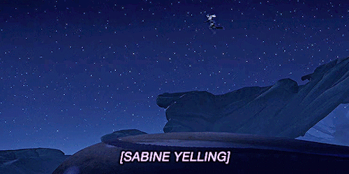 In a wide shot we see the arc of Sabine's jump and it is way too wide, she's about to fall off the cliff. She is yelling.