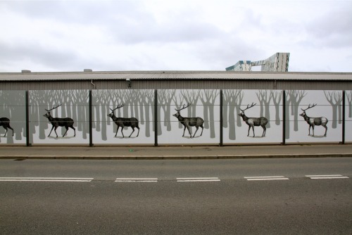 gabrielgovela:Hyuro.Hyuro’s massive street mural in Copenhagen shows the progress of an elk as it jo