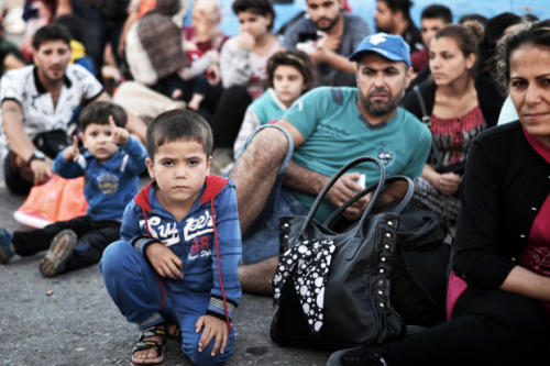 Conditions on the Greek island of Kos are so chaotic the government is housing thousands of Syrian m