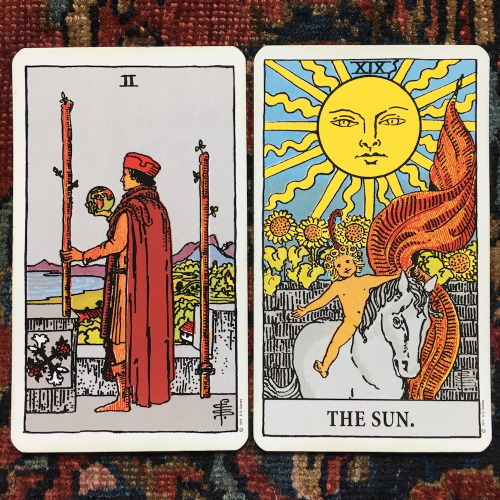 Two of Wands and The SunIf you line them up just right, the shadow of the stick falls on the place w