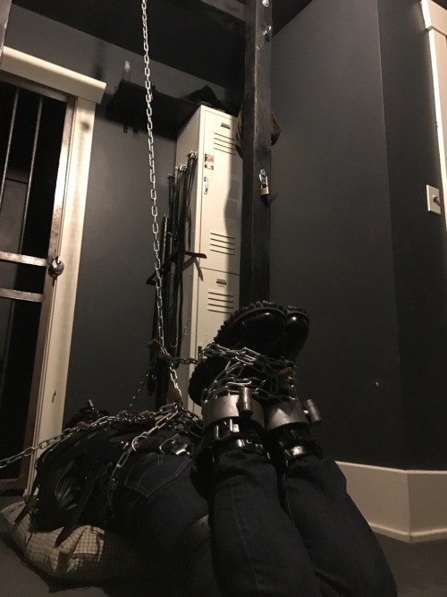seabondagesadist: The “rest” for @lostinsea88 didn’t last all that long before I decided that it was simply not enough bondage and needed correction. A modified straightjacket hogtie was called for.  His legs pulled up and locked to chains around