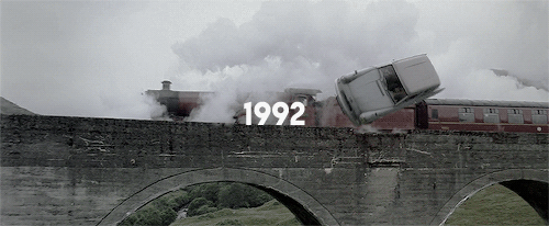 ravnclaws:       A scarlet steam engine was waiting next to a platform packed with people.          A sign over head said Hogwarts Express, 11 o'clock.