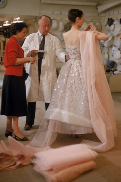 the-king-of-coney-island:  a-harlots-progress:  Christian Dior adjusting a dress on a model in his Paris salon as he readied his collection for a show, February 1957   ⊱✰⊰