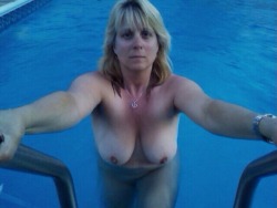 Deb looking alluring and sexy in her pool.