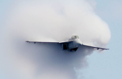 fuckyeahphysica:  The Vapor Cone.A vapor cone, also known as shock collar or shock egg, is a visible cloud of condensed water which can sometimes form around an object. A vapor cone is typically observed as an aircraft, or object, flying at Transonic