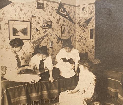 blondebrainpower:Syracuse University students using a Ouija board in 1909. “Florence, Gladys, and Ruth. Another view in Hazel’s room. Vesta on the floor. Ouija board telling stories. Ouija always tells the truth.” Instagram.com/syracusehistory