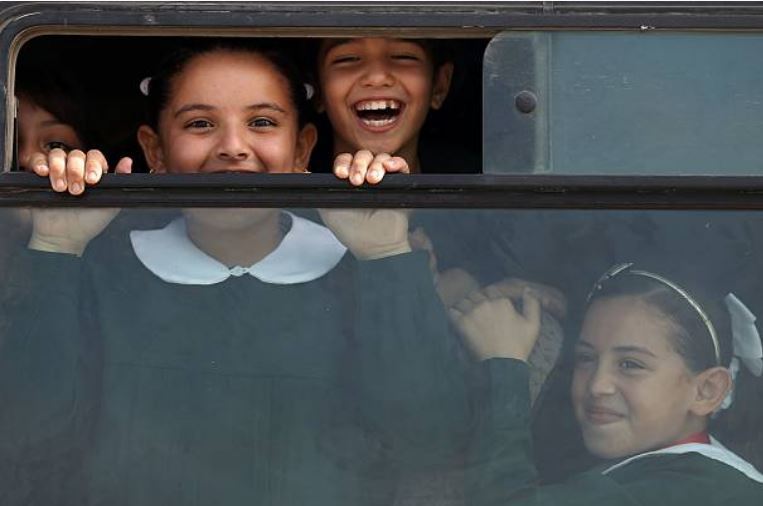 tanyushenka:  Photography: Palestinian school girls smile to the camera as they