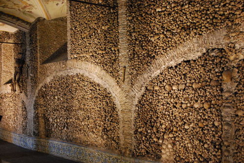 Capela dos Ossos (English: Chapel of Bones) Located in the walled medieval city of Evora, Portugal, the Capela dos Ossos is a 16th century Franciscan chapel lined with skulls and bones that stretch over the interior groin vaulting and all over the walls.