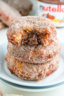 savagelydelicious: Nutella Cinnamon Sugar Doughnuts  http://bakerbynature.com/nutella-cinnamon-sugar-doughnuts/   @celticknot65 😏