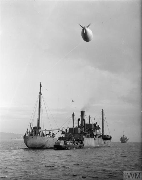 Barrage balloons for merchant ships in convoy, to defend againstdive-bombers (Greenock or Gourock, S