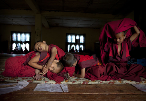 cacophiliac:  silvermender:  awkwardsituationist:  novice buddhist monks. photos: 1. mahabodhi temple in bodh gaya, india by rajesh kumar singh; 2. thimpu, bhutan by roberto schmidt; 3. tibet by brian sokol; 4. mandalay, myanmar by bonnie stewart; 5.