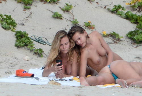 toplessbeachcelebs:  Edita Vilkeviciute (Model) sunbathing nude in St. Bart's (April 2014) 