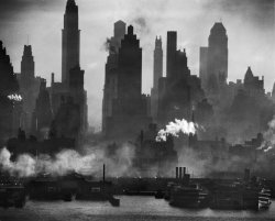 luzfosca:  Andreas Feininger A view of bustling, raucous New York City, looking straight down 42nd Street, January 1946. From Time &amp; Life Pictures/Getty Images 