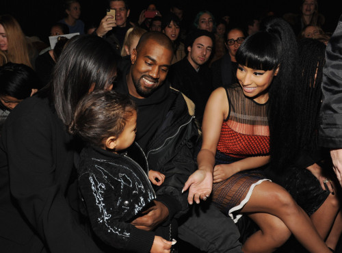 lovekardashian: Kim Kardashian, Kanye West, North West, and Nicki Minaj attend the Alexander Wang Fashion Show during Mercedes-Benz Fashion Week Fall 2015 at Pier 94 on February 14, 2015 in New York City