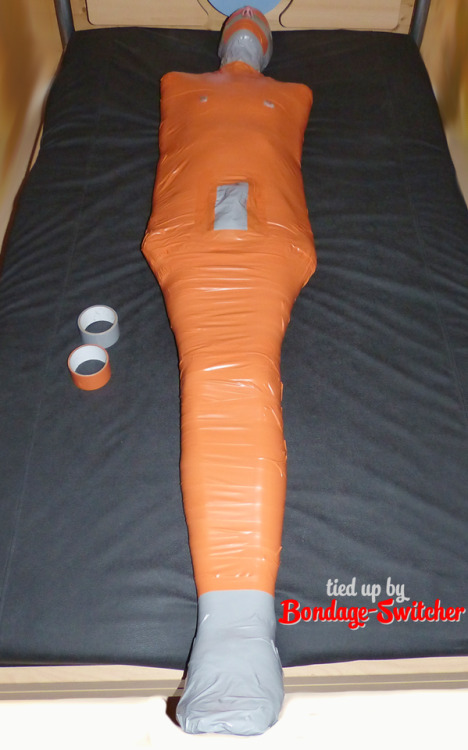 bondage-switcher: Well, I simply wanted to use up some rolls of orange pvc tape. So I thought the be
