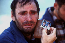 foxfire-burns:  Mustafa Xaja, an Albanian man from the town of Mitrovica in Kosovo shows pictures of the two sons he feared were killed by Serbs. He had just been released from a Serbian prison and was forced to cross the border into Albania. He later