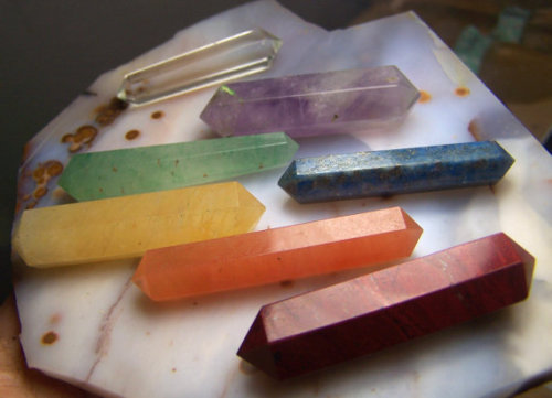 cassandra-alicexx: Double Terminated Rainbow Chakra stones - crystal polished point set red yellow g