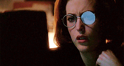 wowdanascully:Scully + “when she gets computer reflection light on her glasses” {requested by anonym