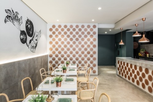 {Spanish firm estudiHac designed this restaurant in Valencia, using traditional materials such as ma
