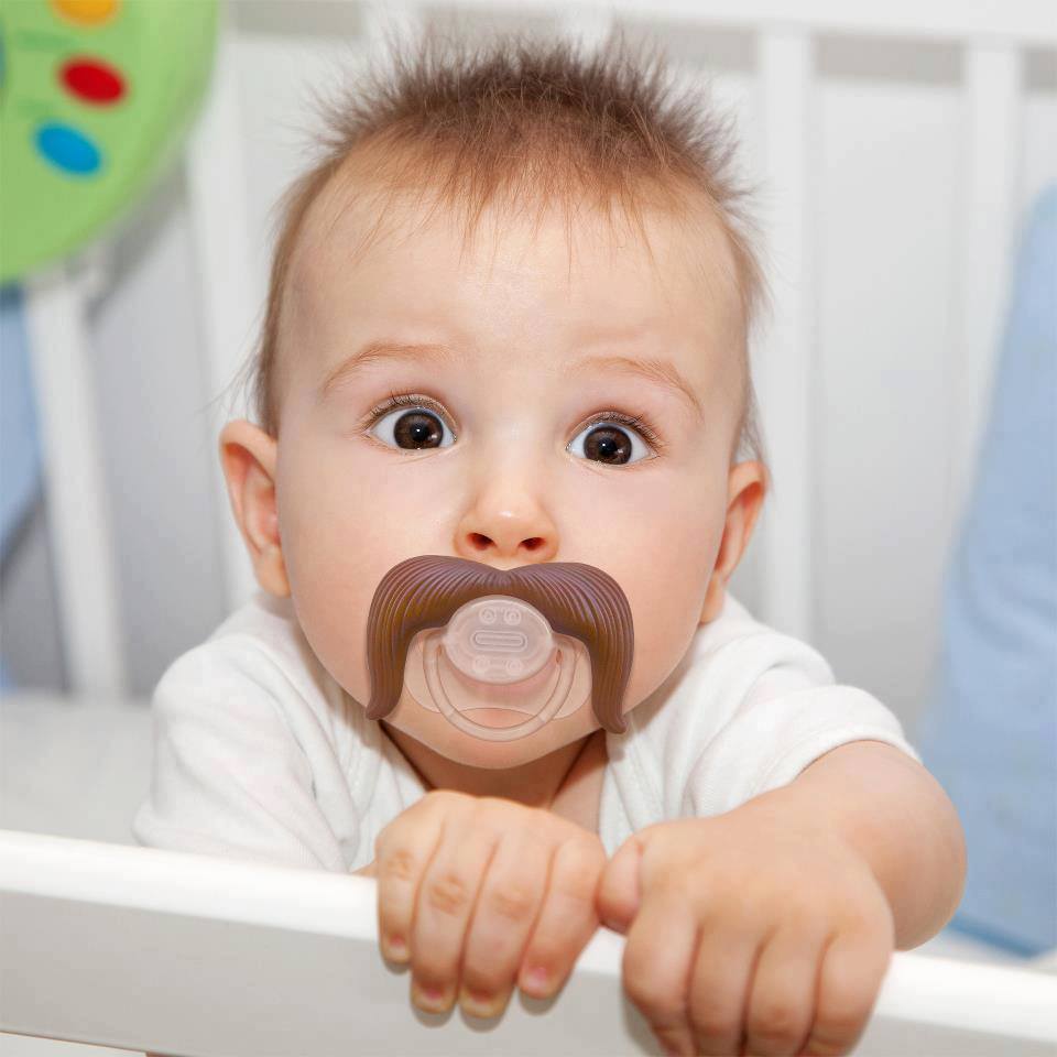 Cute baby girl pacifiers