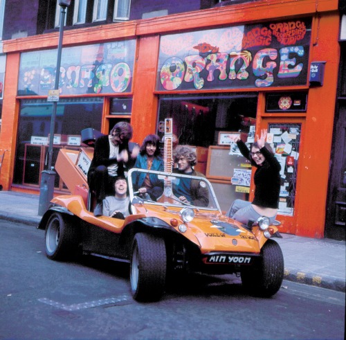 cannedbluesblog:Peter Green in an Orange Amps Buggy (Danny Kirwan is holding the guitar) 1970. Colou